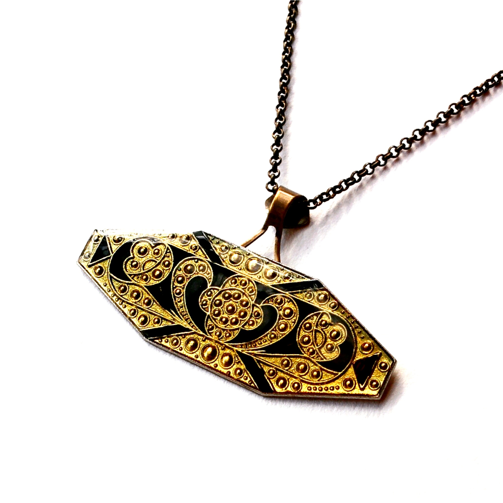 Detailed vintage brooch converted to a one of a kind pendant.