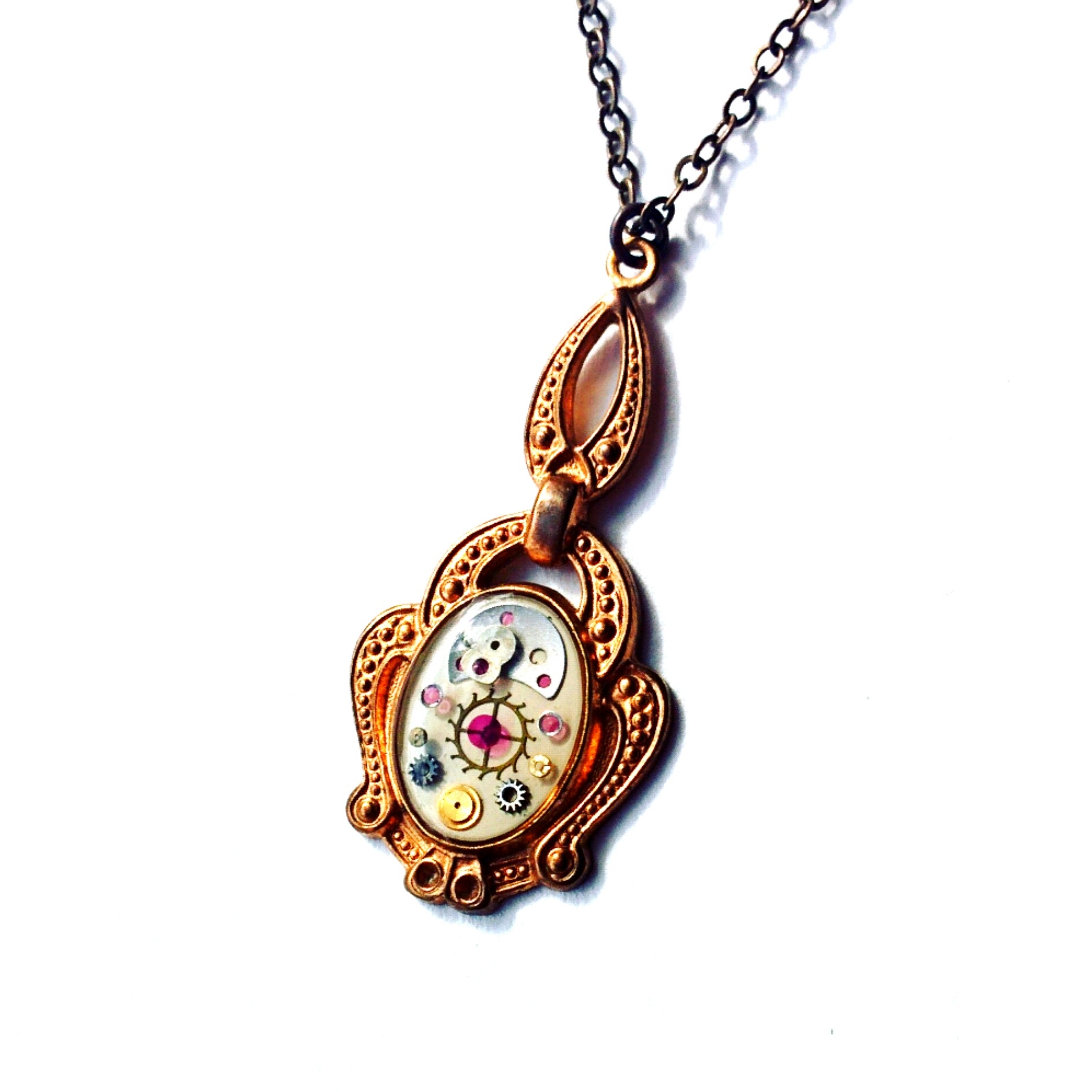 Vintage copier pendant base with abstract watch part design, cast in resin