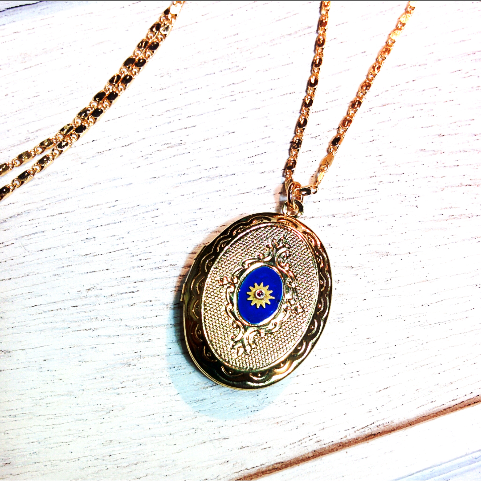 vintage locket with minimal cog detail