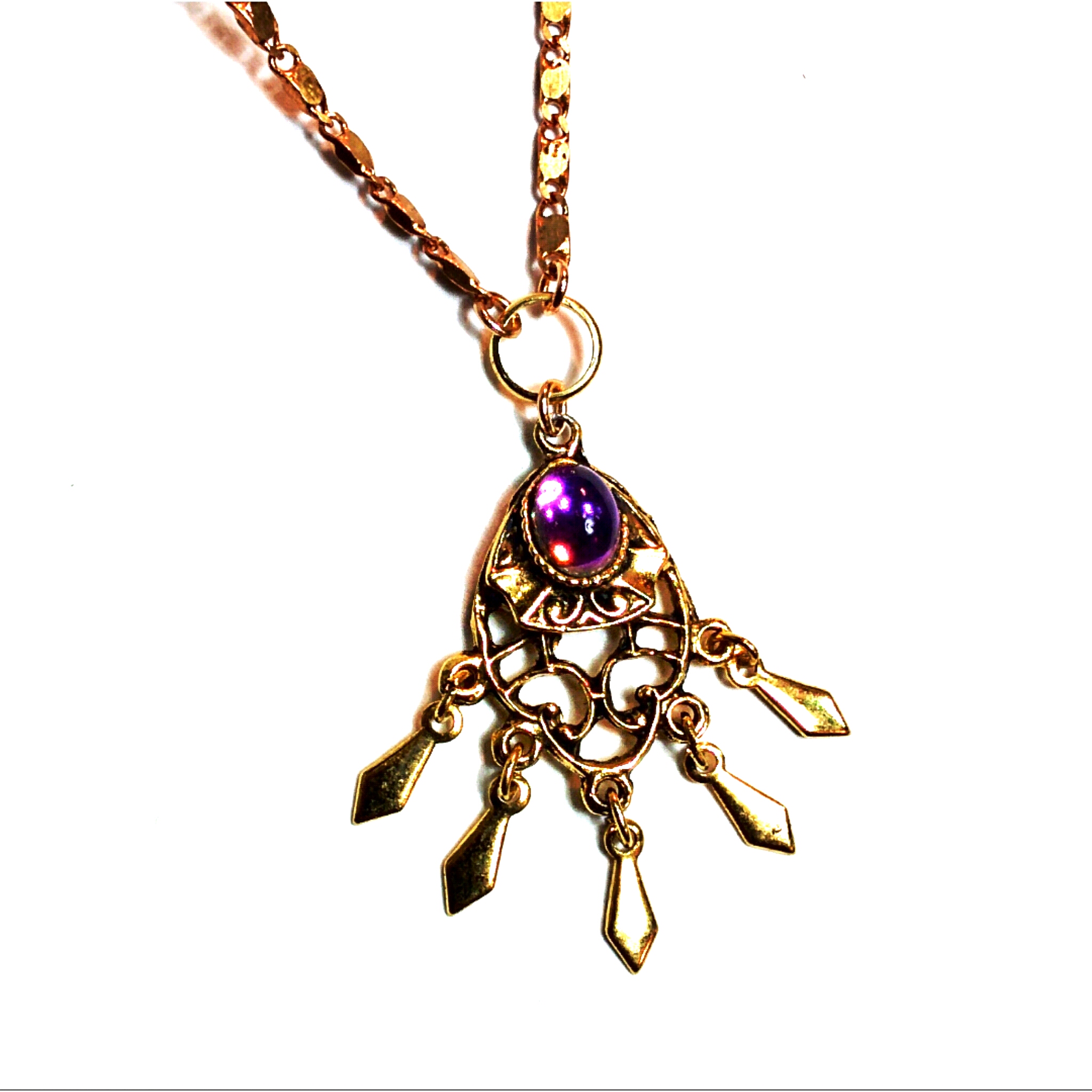 Beautiful vintage pendant with purple stone and fringe