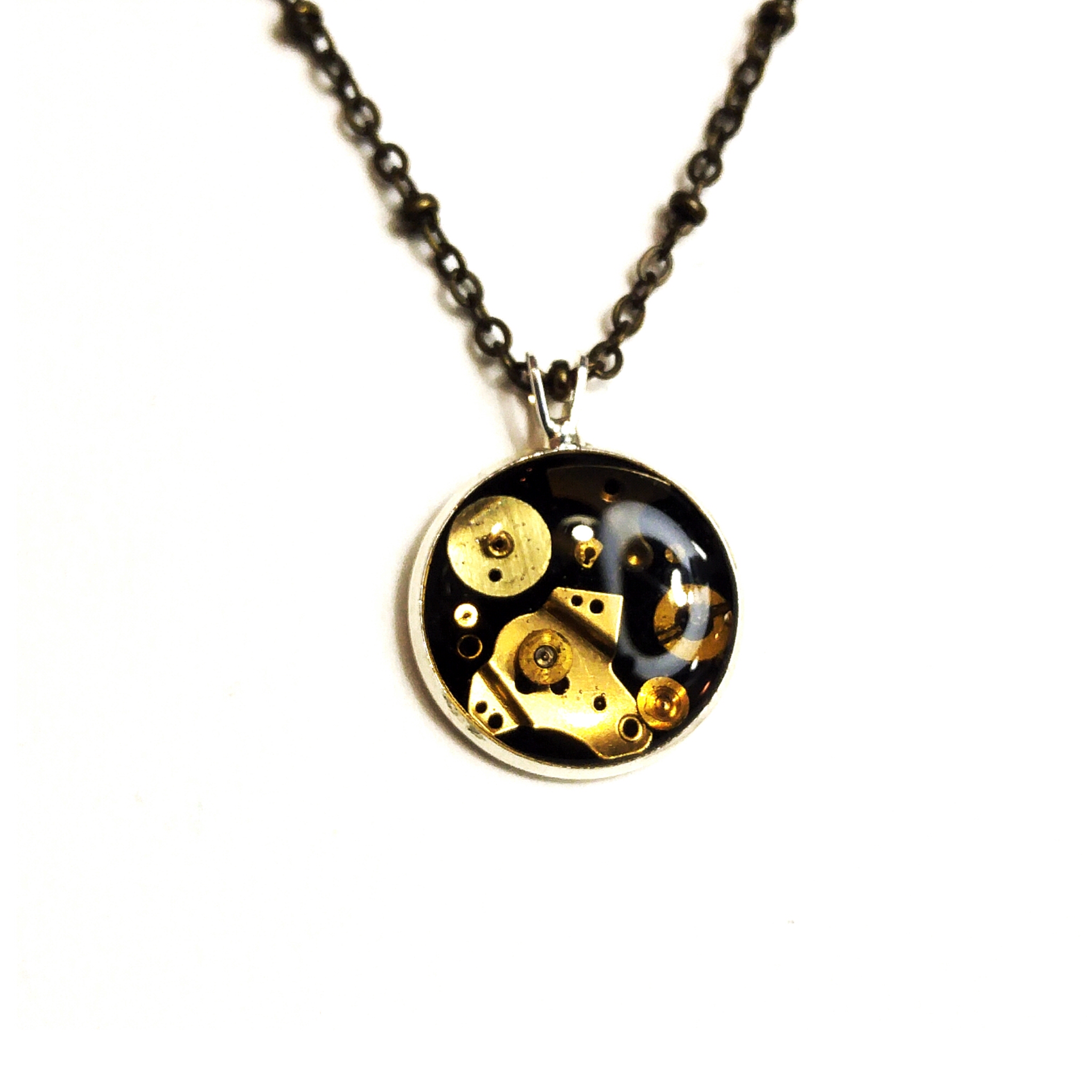 Golden beauty! Such soft warm tones in this half inch pendant, complete with both vintage, and antique parts!