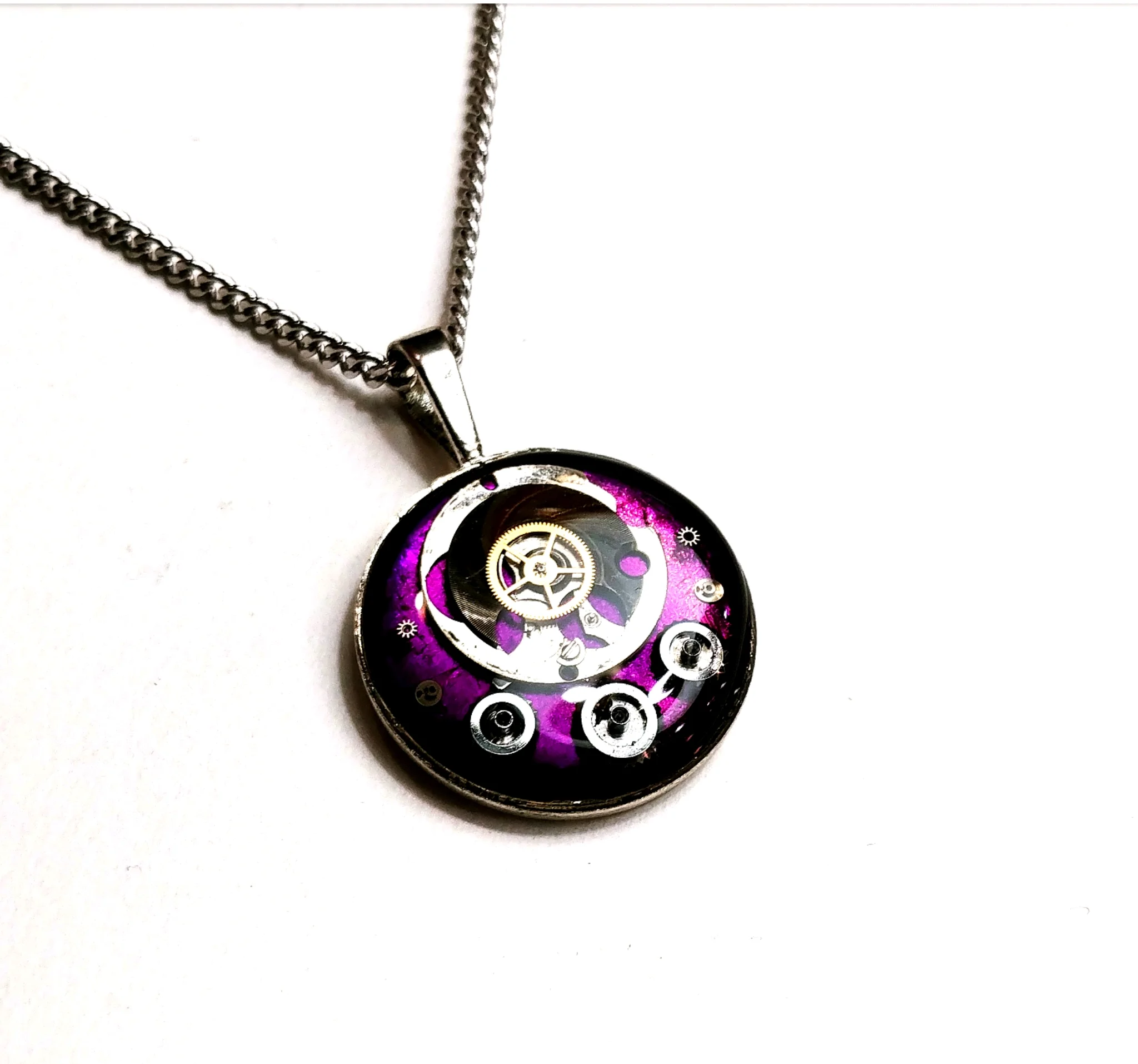 Rich purple resin watch parts pendant, available at the Leslieville Arts Market