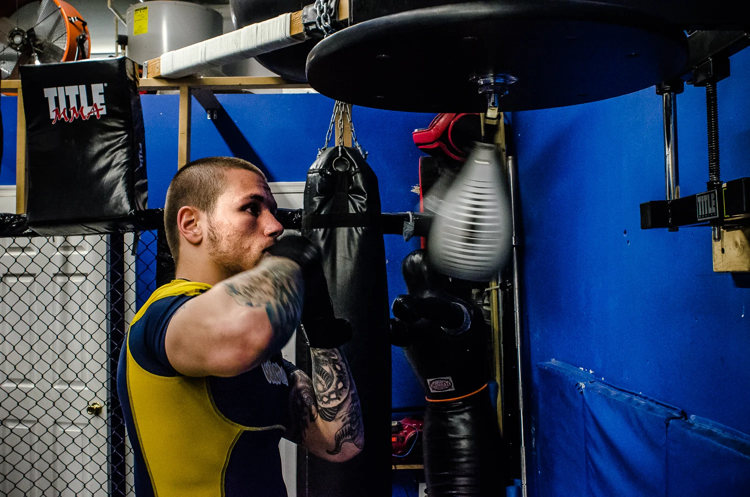 Vince punching a speed bag as he prepares for another day of training. -4.15.2014
