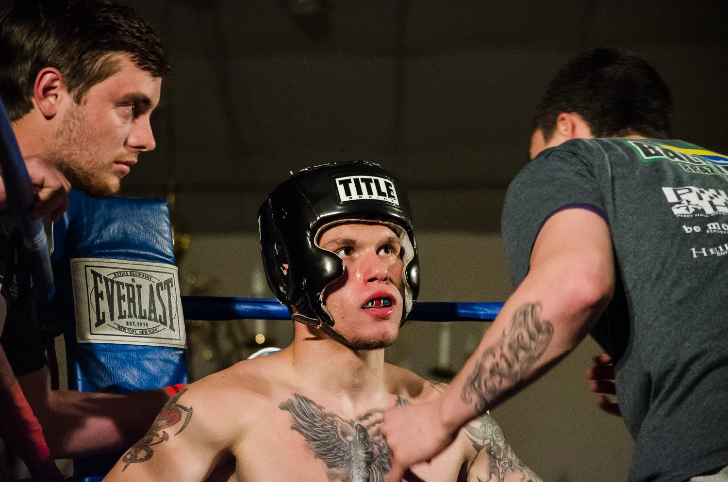Corner coaches Ricky Foxwell and Chris Ricker prepare Vince for the second round. 4/26/2014