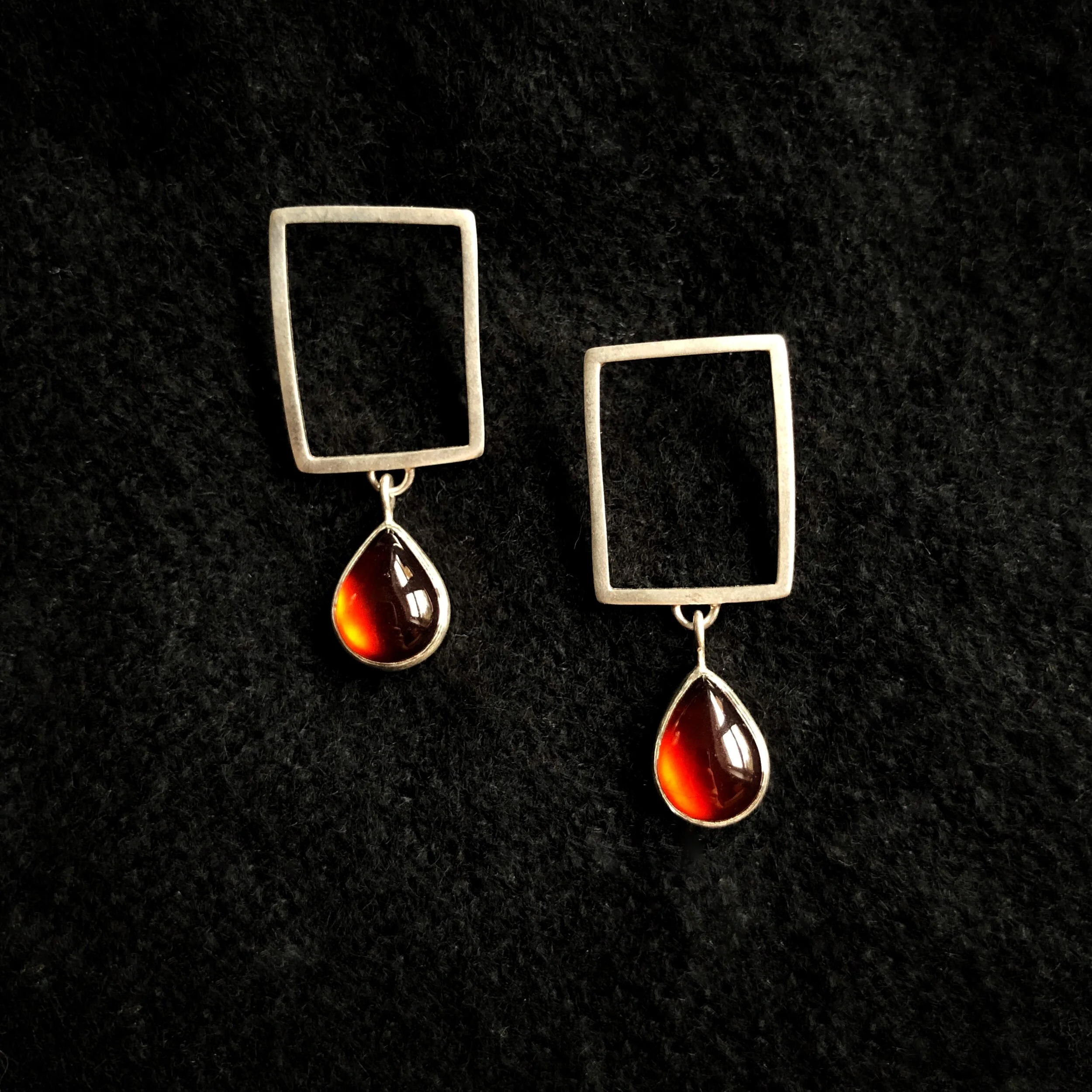 Aperture Earrings with Garnet Teardrops
