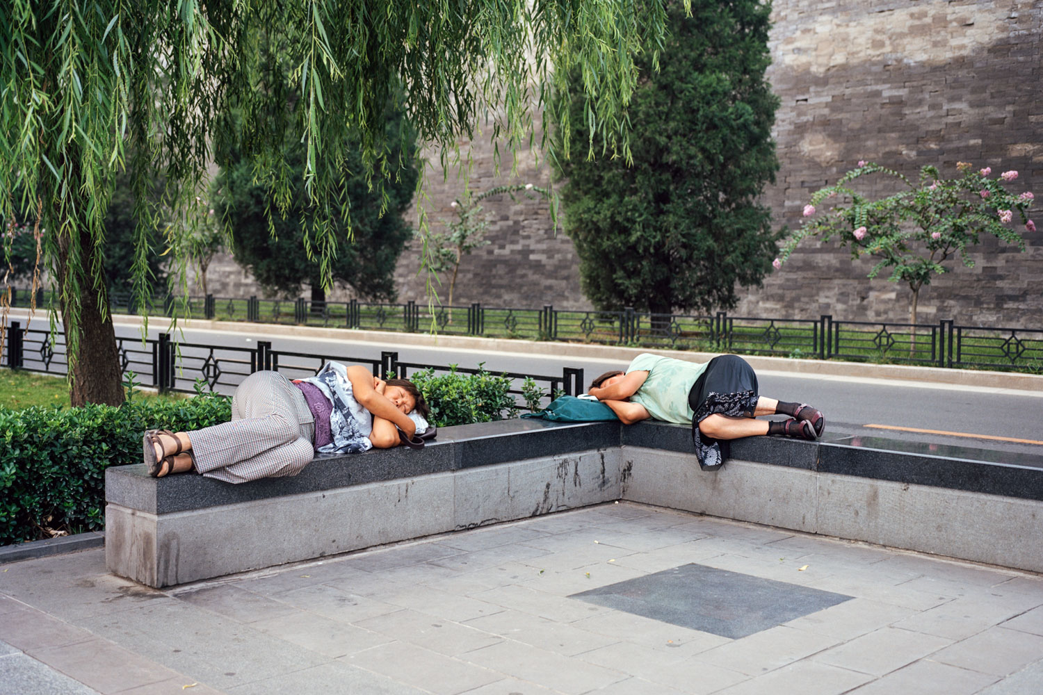 Napping outside the Forbidden City