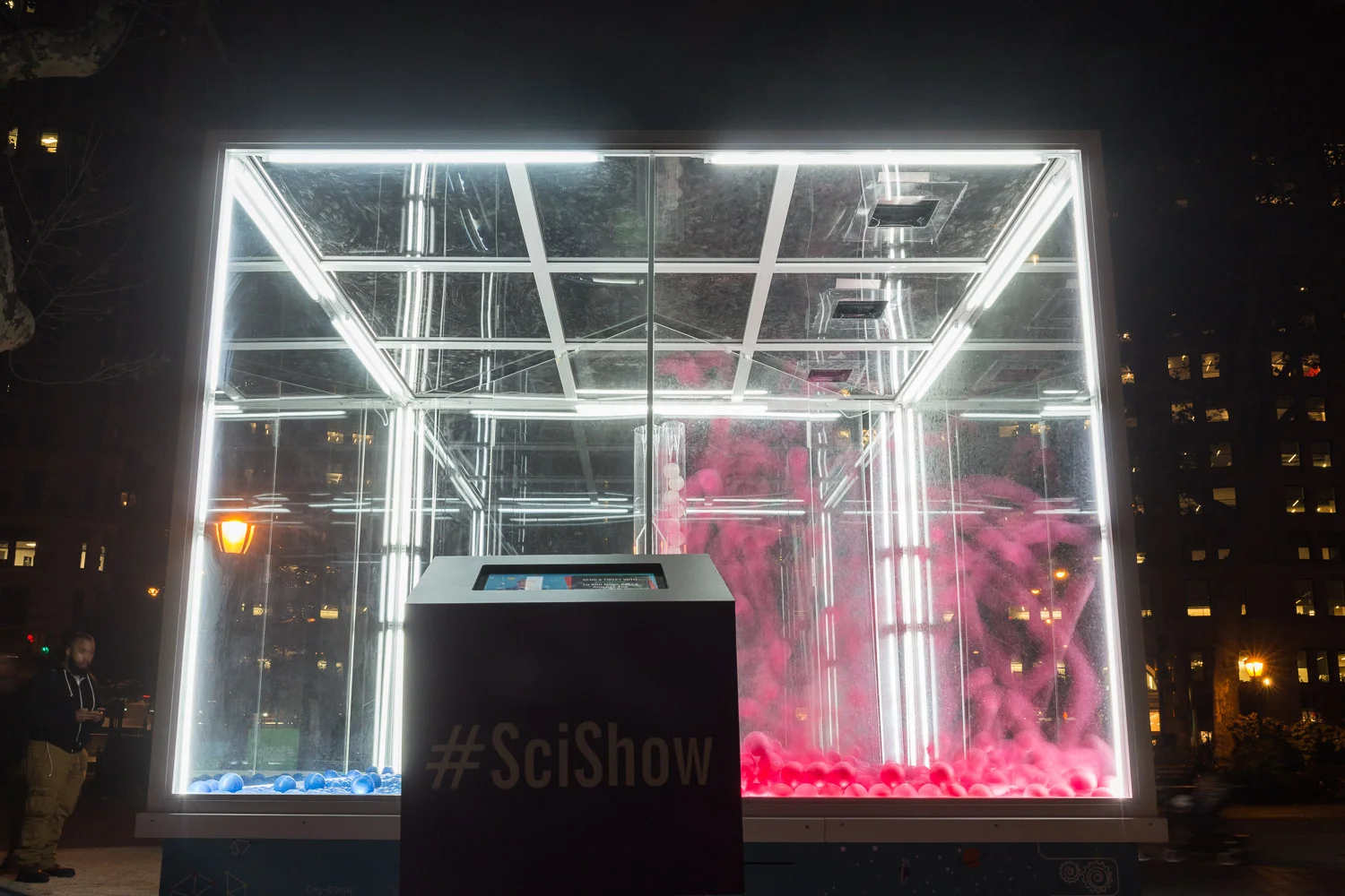 YouTube/ SciShow energy demonstration illuminates the night. The #SciShow box displays info about the event.