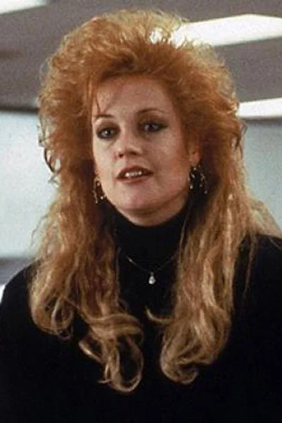 Melanie Griffith before hair cut...she's a secretary with a cheating fiance and lives on Staten Island