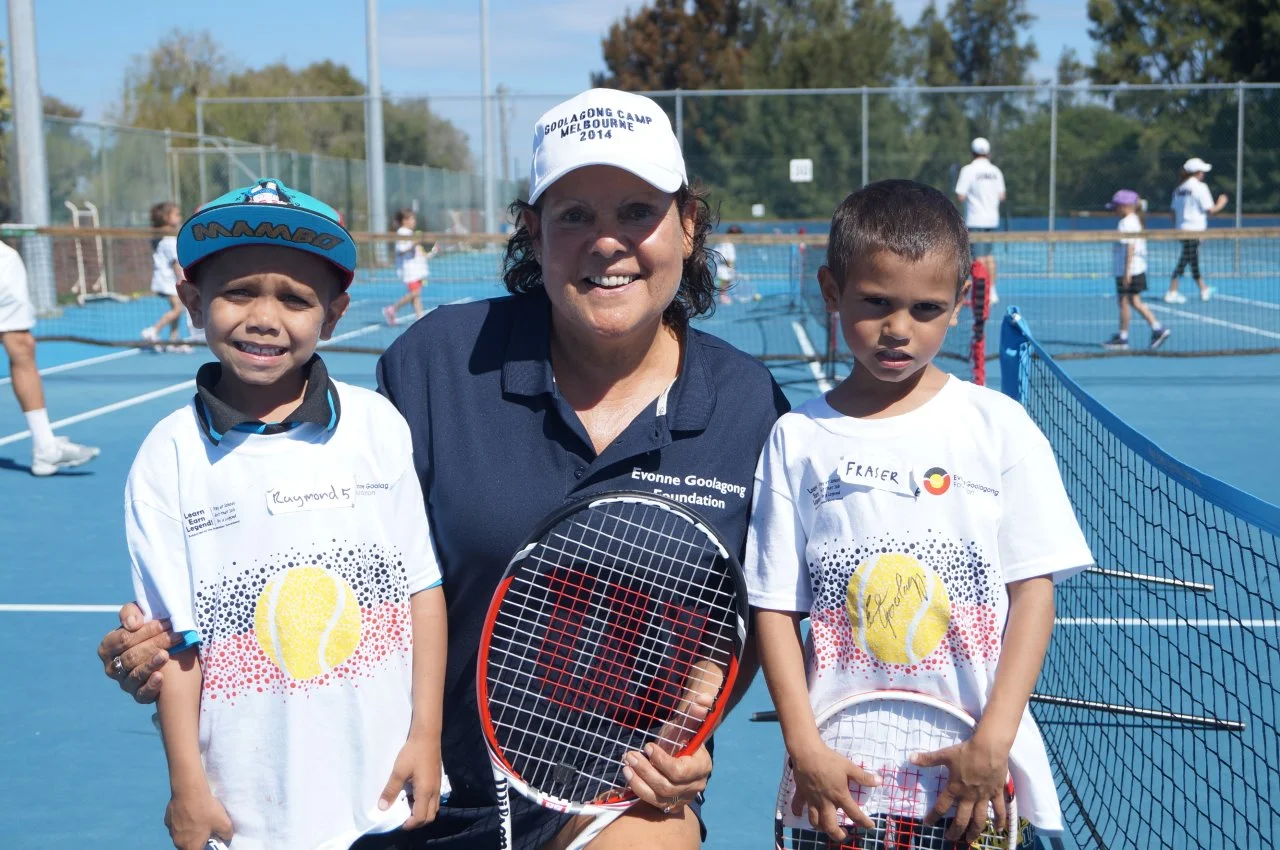  Evonne receiving tennis tips from two young champs!