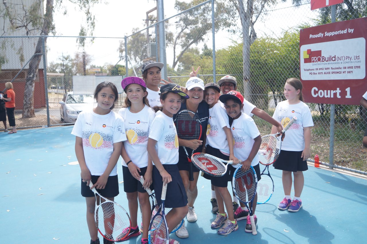  Evonne with a bunch of happy kids in Alice