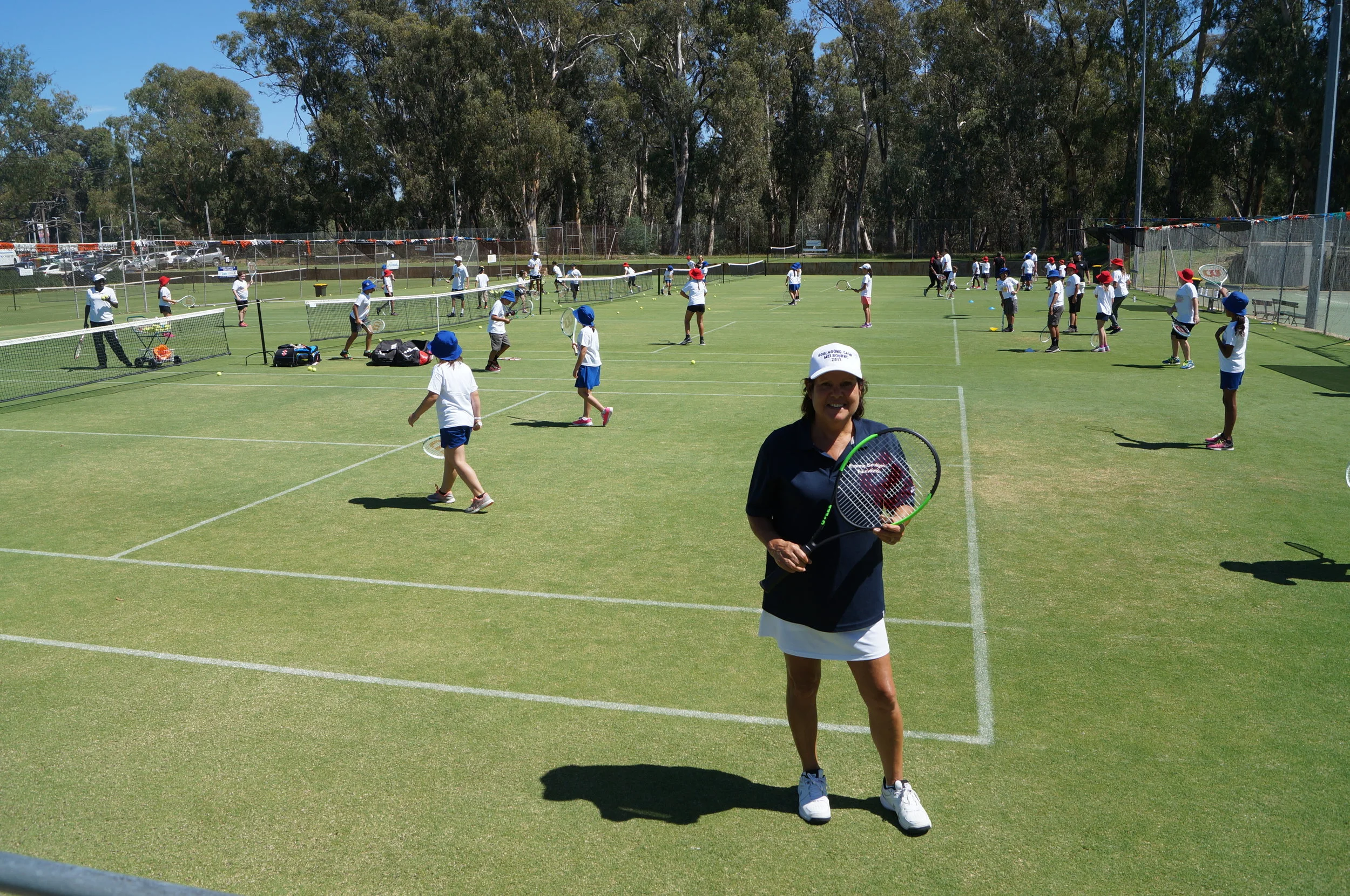 Evonne loves those courts full of girls and boys having fun and learning to eat healthy and stay in school