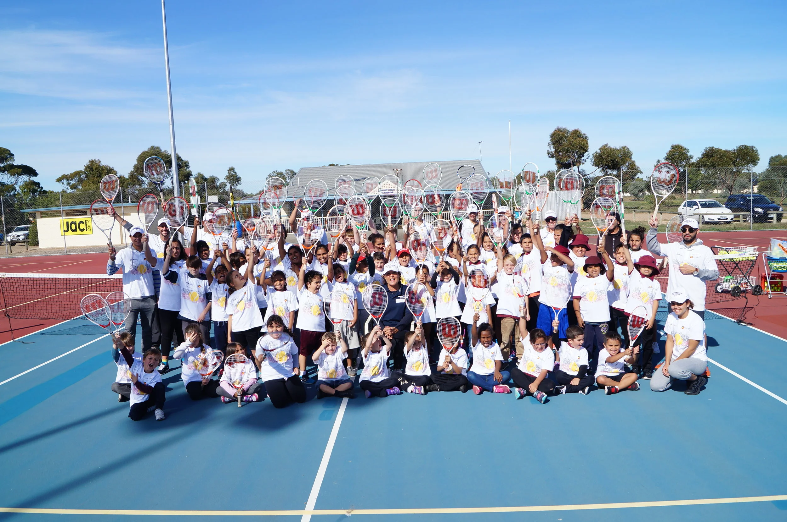 Murray Bridge Mob tipping their racquets for Evonne