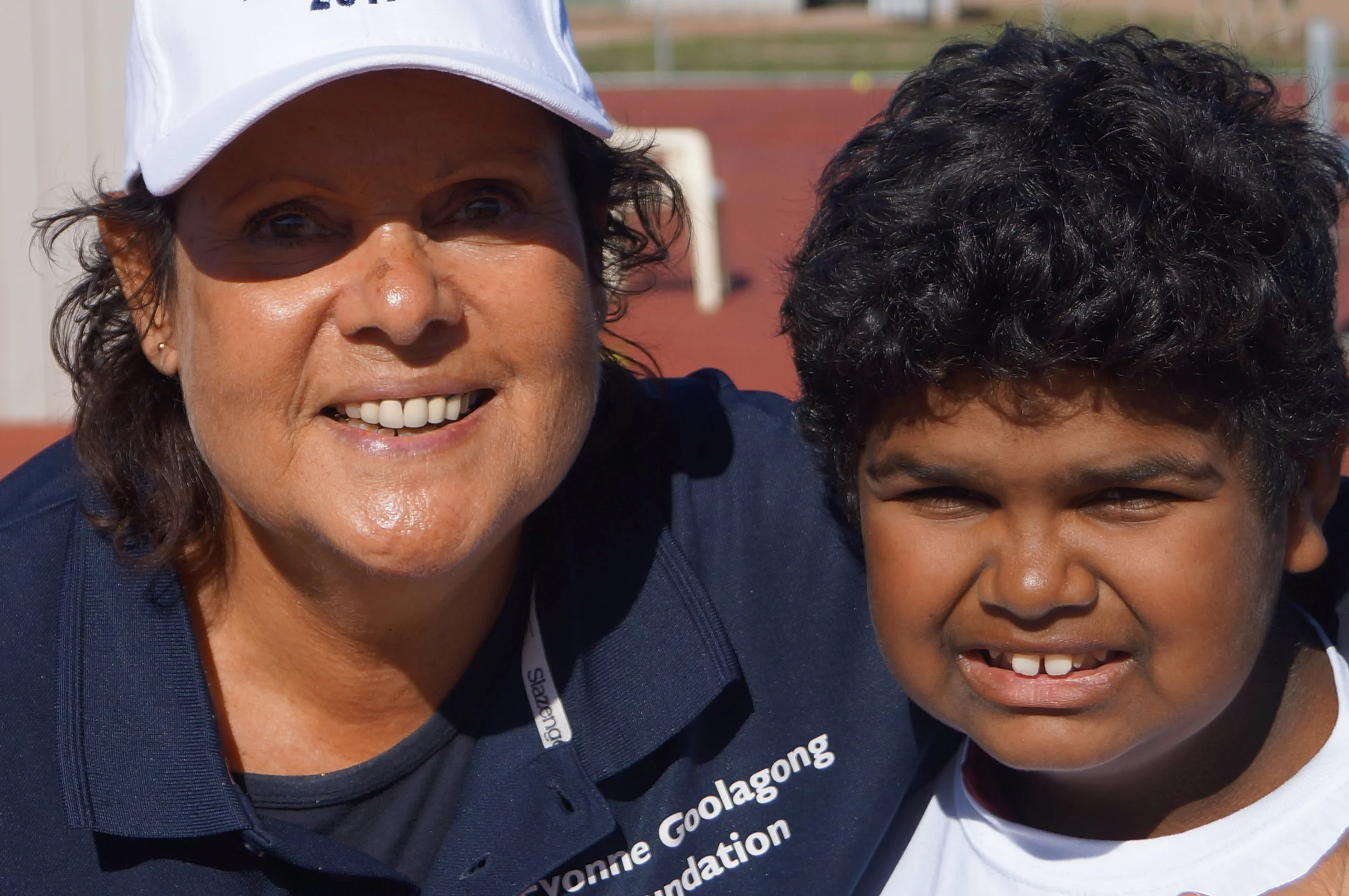 Two cuties showing off their teeth In Murray Bridge