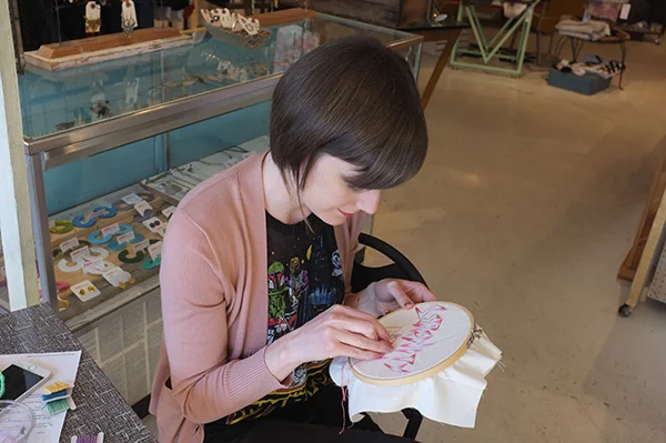 meanwhile, here i am mad scientisting the shit out of a freehand design of some words i've wanted to cross-stitch for a loooooong time......