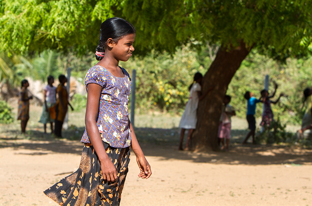 A student at Thampanamvely after schools club, Chenkaladi, Sri Lanka - 7°45'35" N 81°35'0" E