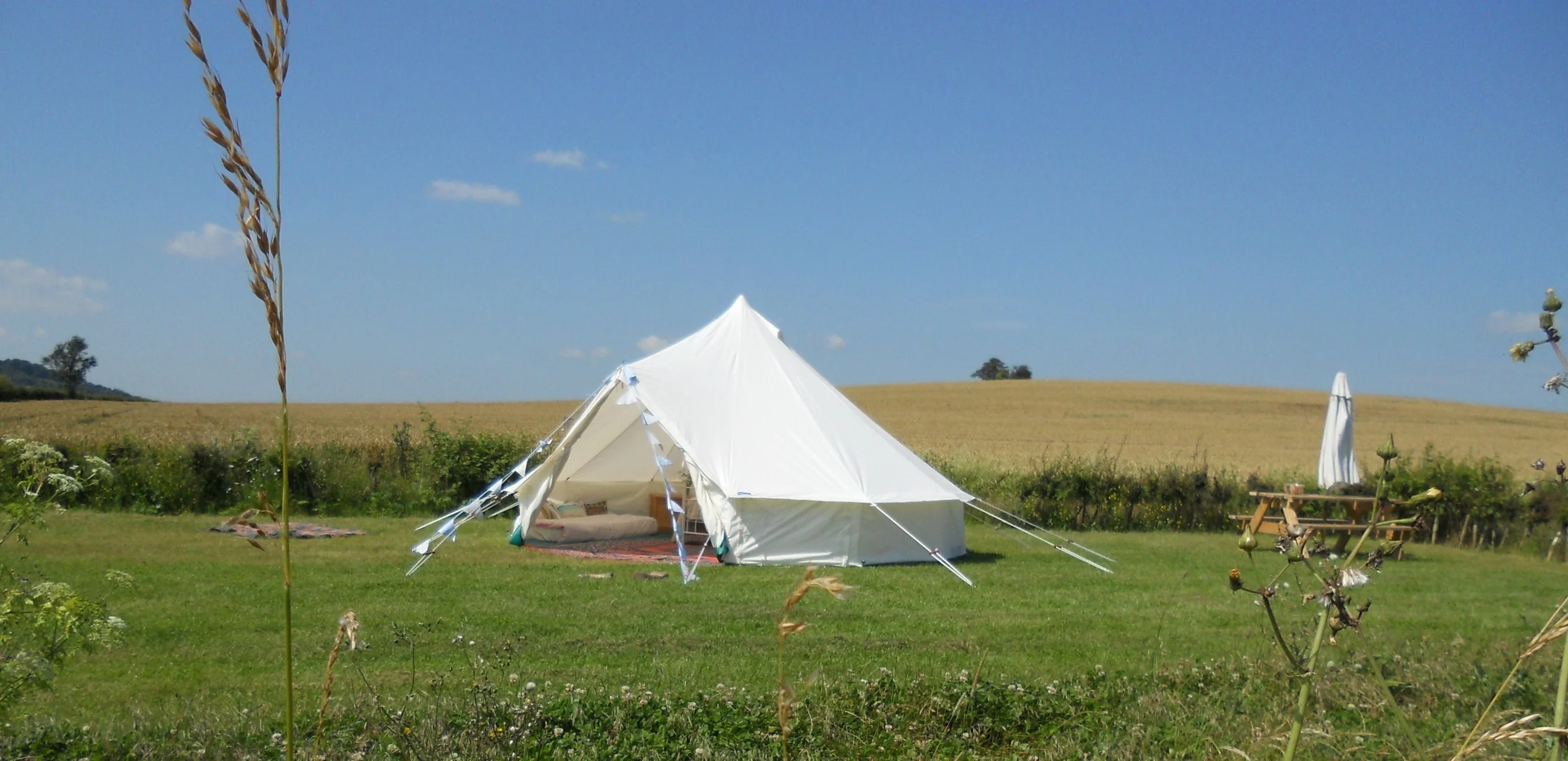 DISTANCE SHOT OF TENT IN SUN (2).JPG