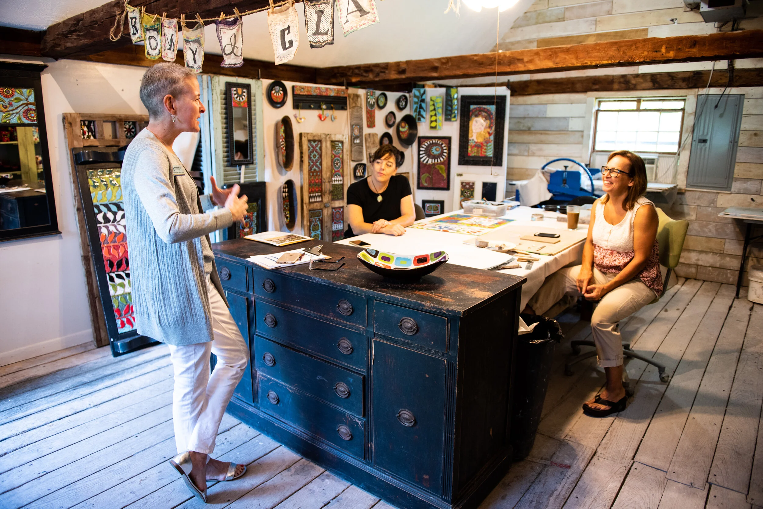 Indiana Arts Commission’s Deputy Director of Operations, Miah Michaelson visits with Romy and Clare in their Japer, Indiana studio.