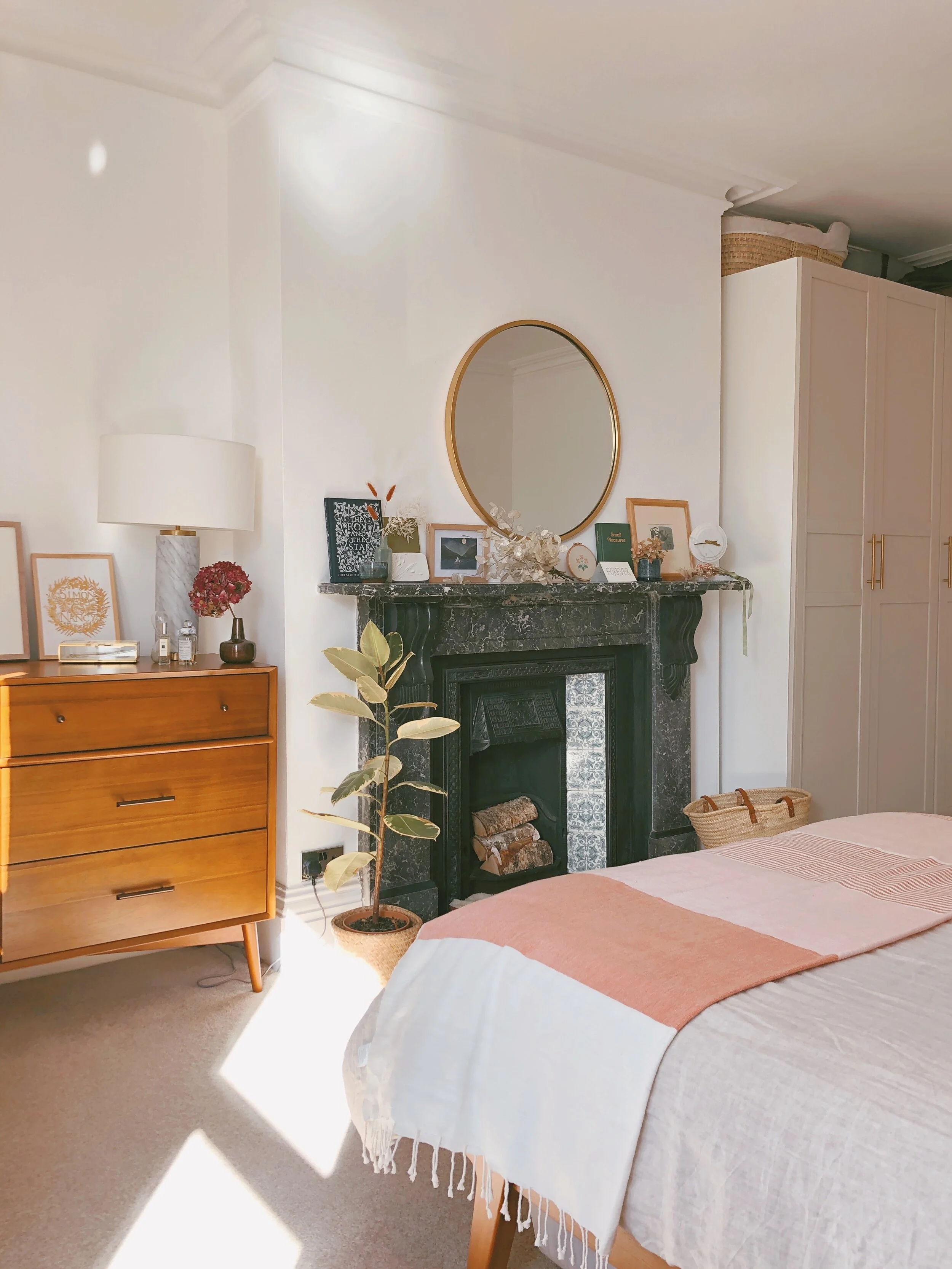 I love how the sunlight streams in through the window and brings out the warmth in the room.