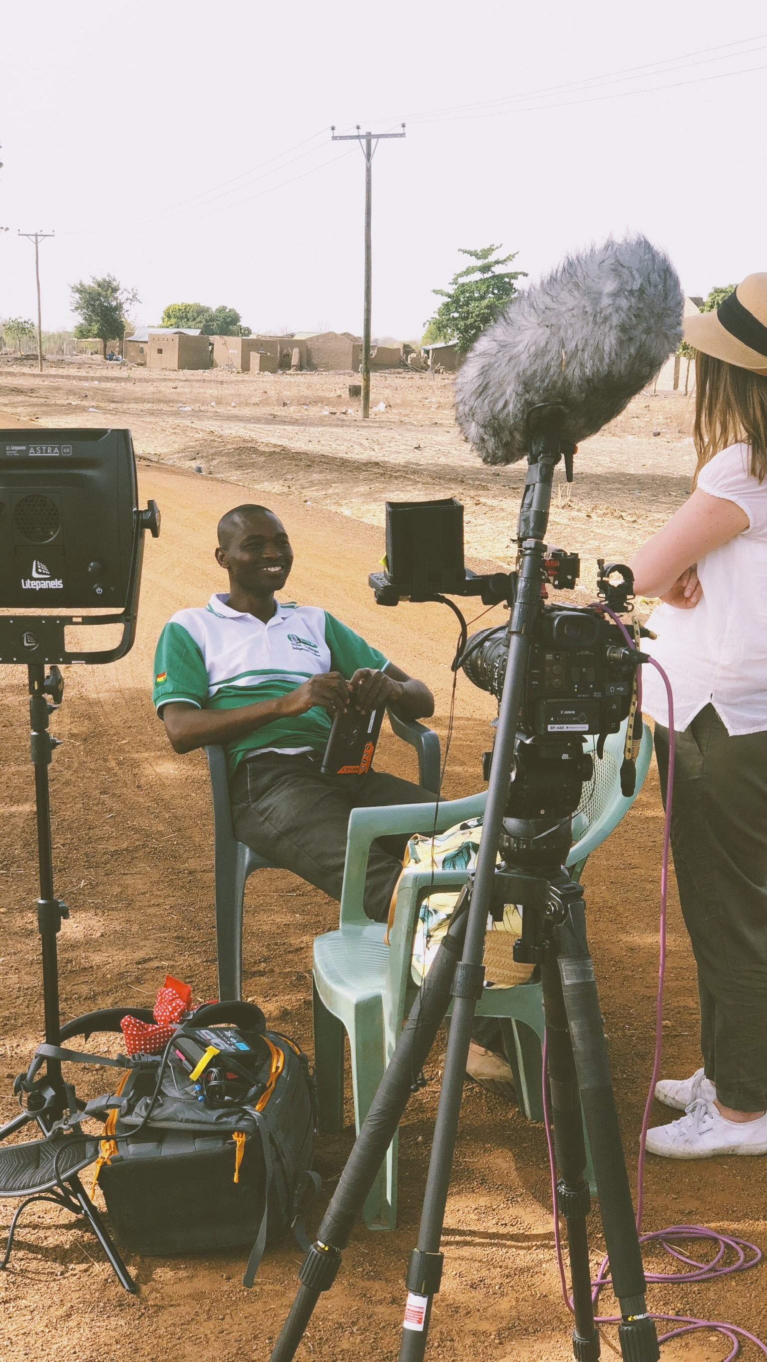 Setting up outside the Kayelo Community in Ghana. Canon C200 with the CN-E 18-80 lens and Litepanels Astra 6X Daylight.