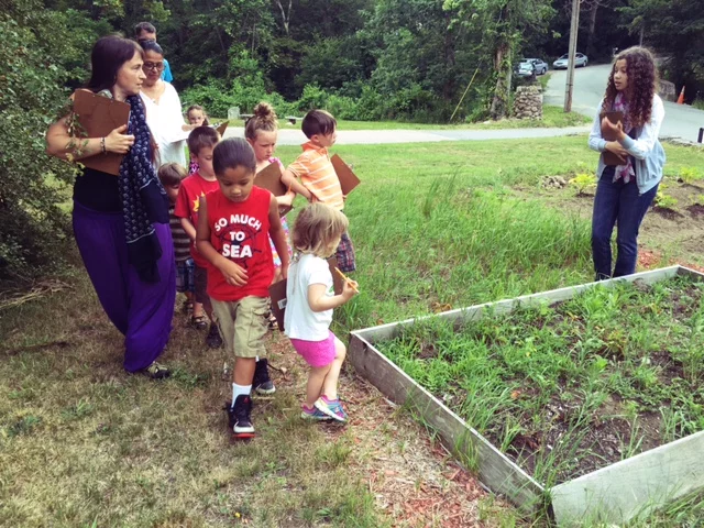 Museum Educator Lynsea Montanari with a Children's Hour group.