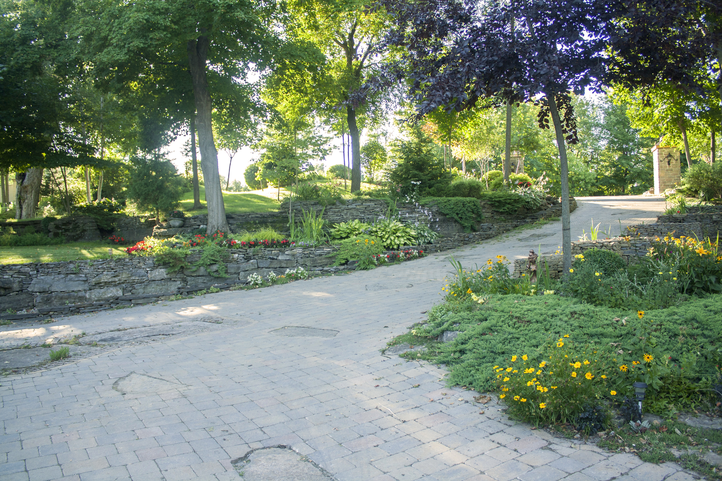 Landscape Design | Landscaping | Terrace Gardens | Driveway | Dry Lay Stone | Waterfront Dream Home | Riverview Design Solutions | Prescott, Ontario, Canada