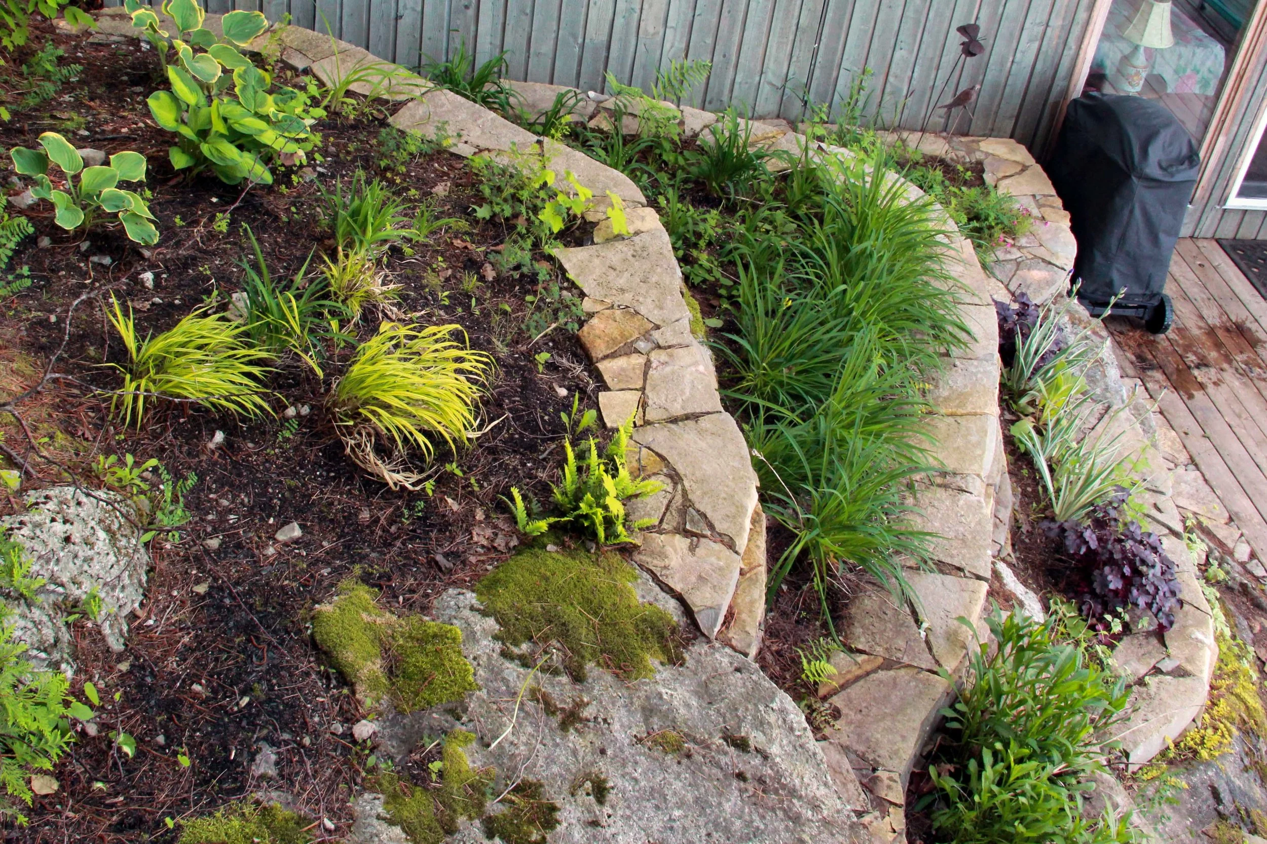 Riverview Design Solutions_Charleston lake Island_Drylaid Stone Planters - Copy.jpg
