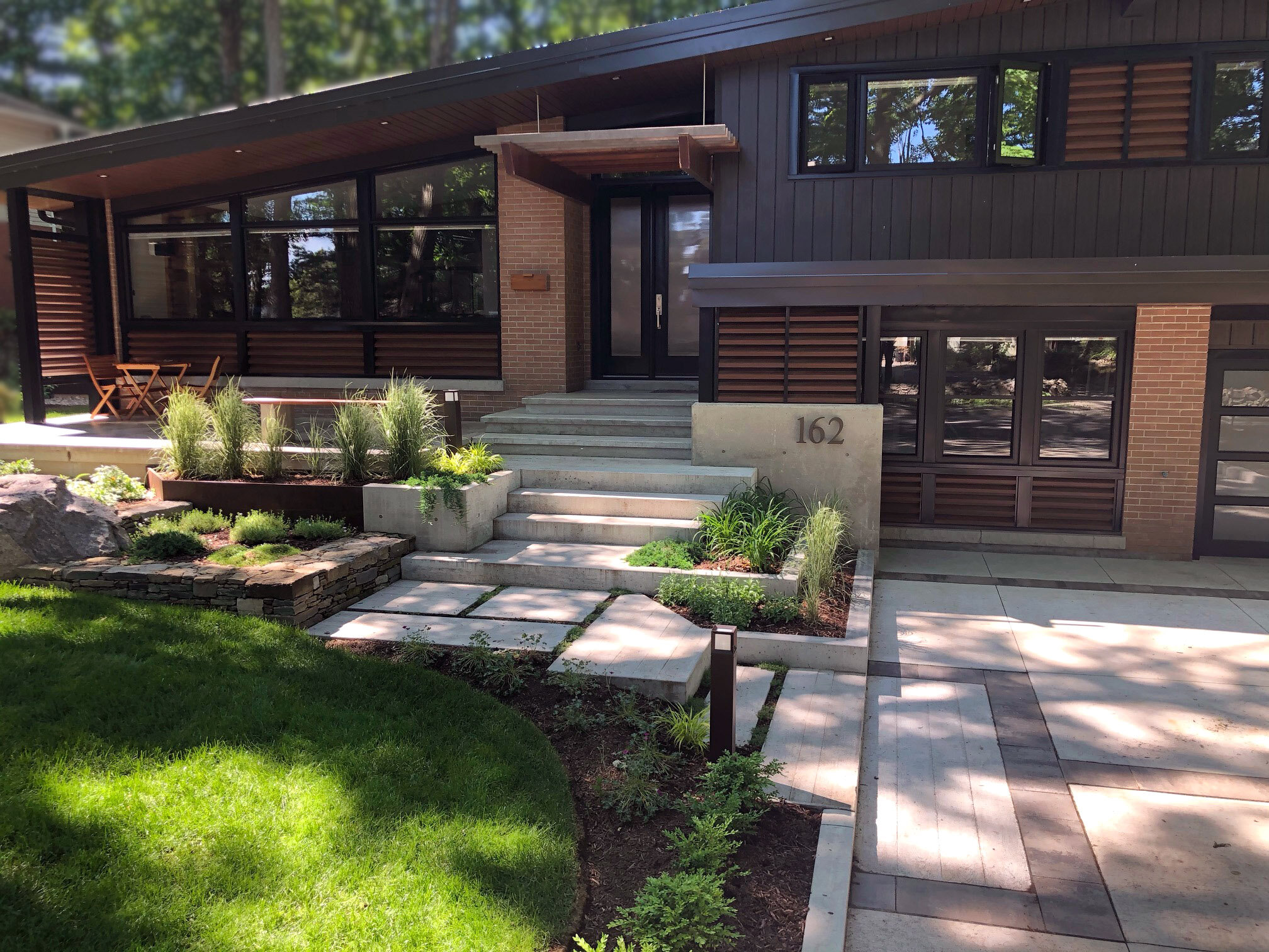 Mid-Century Modern Front entry- Modern touches-Landscape design-Hardscape-Conrete driveway.jpg