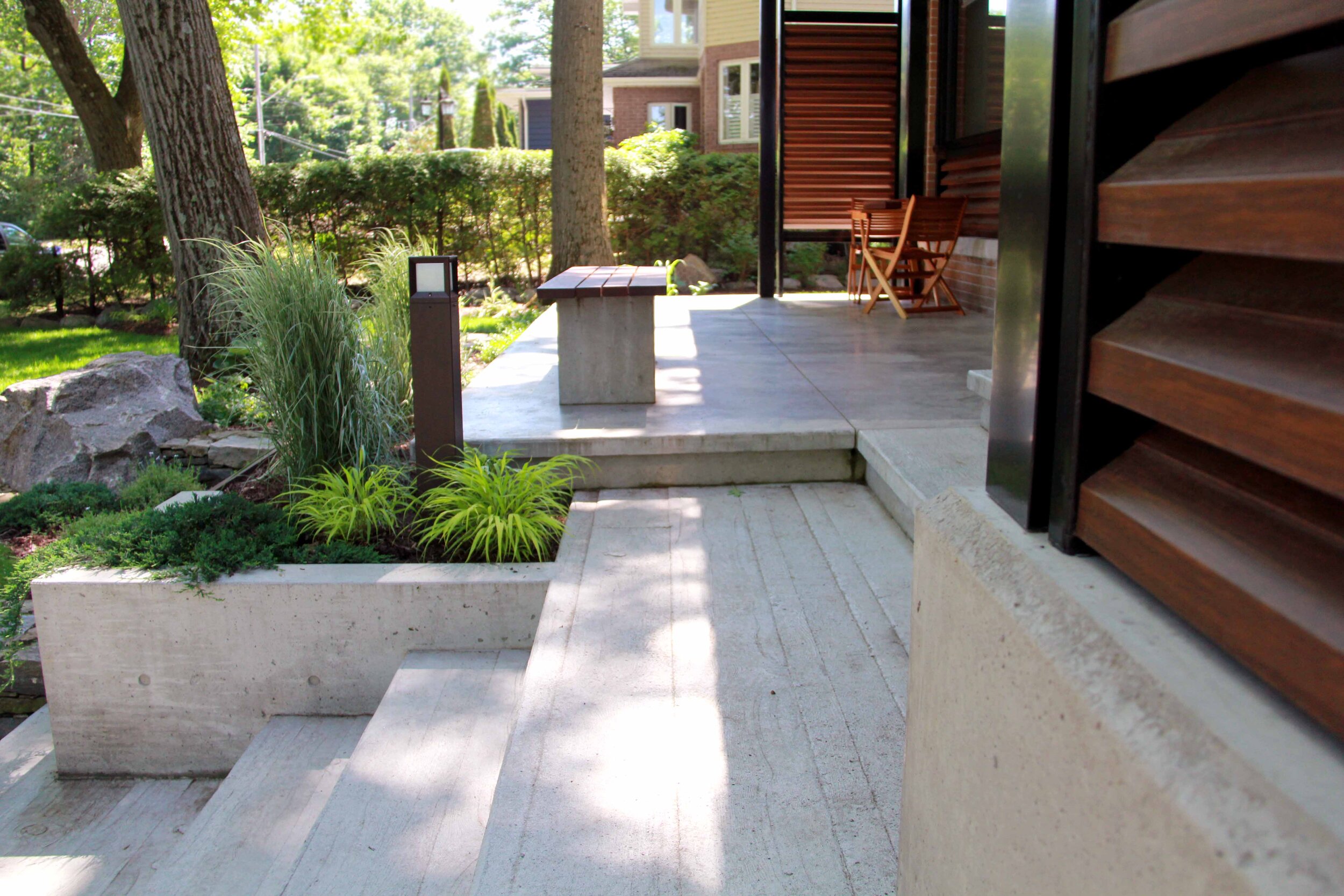 Mid-Century Modern-Modern Landscape-Raised Garden Bed-poured Concrete- Conrete Stamp-Modern Features-Front porch-MOdern Finishes.jpg