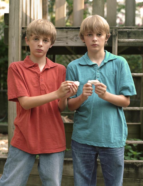 Twin boys with shells (2011)