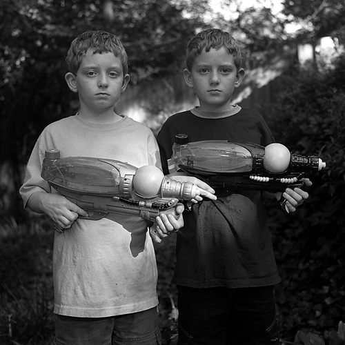 Dylan and Evan with water guns (2005)