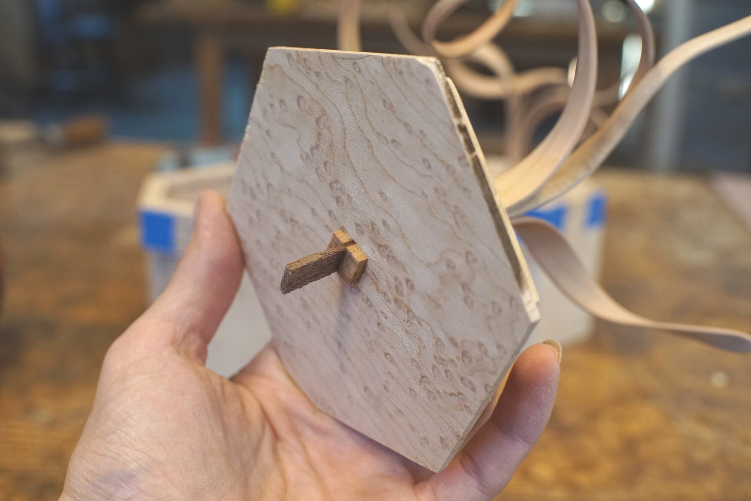 Spirals get mortised & wedged into the lid panels