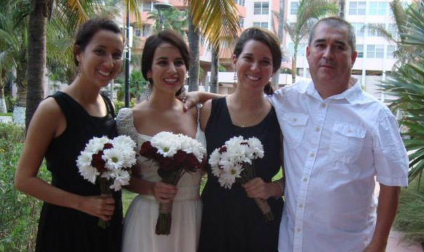 Evelyn with her sisters and father