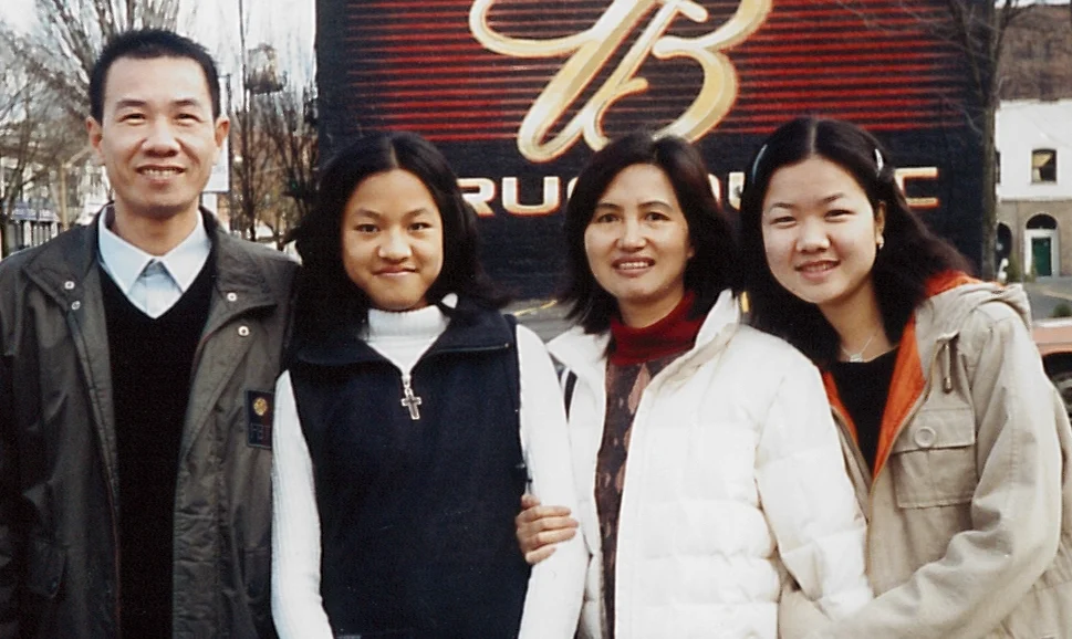 Ah Lan with her husband and two daughters