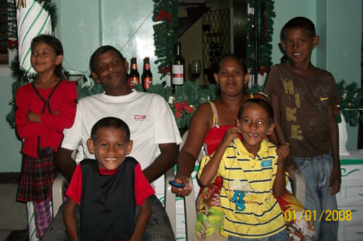 The twins' mother with their half-siblings in Guyana