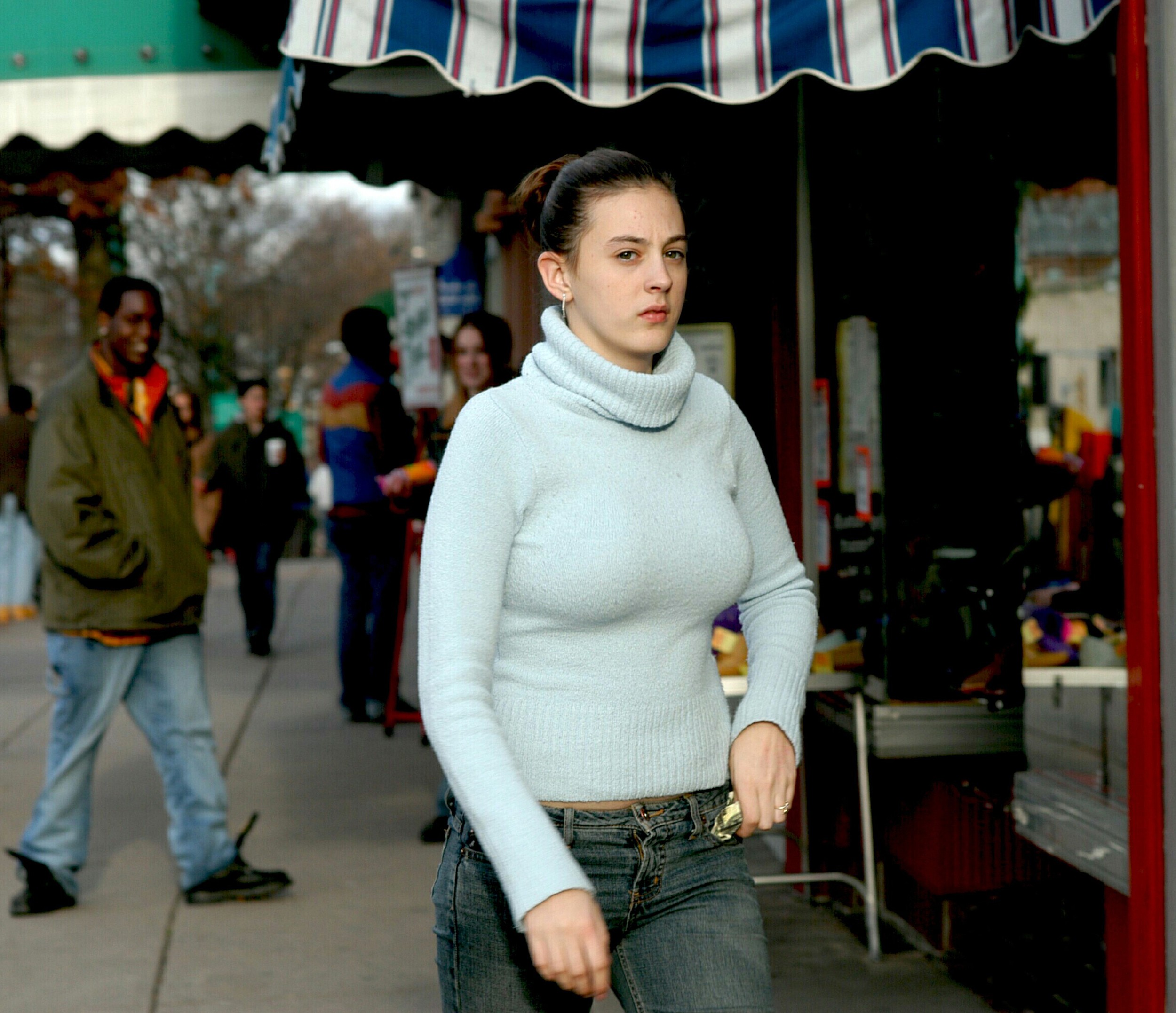 Girl in a blue sweater and watcher.jpg