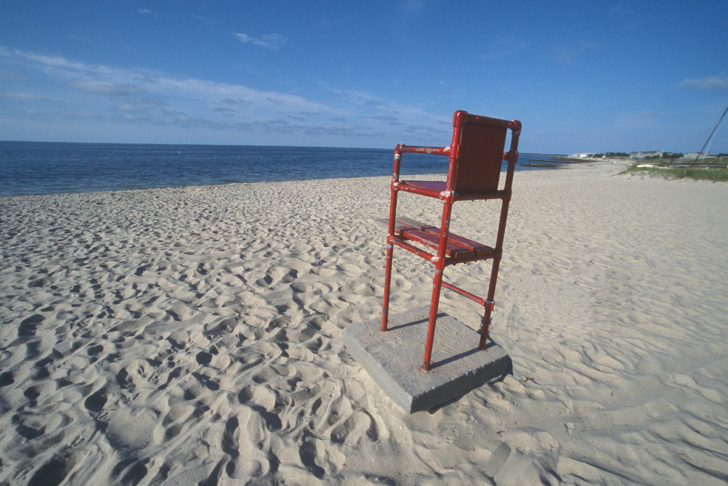 tall red chair in the sand-no shadow.jpg