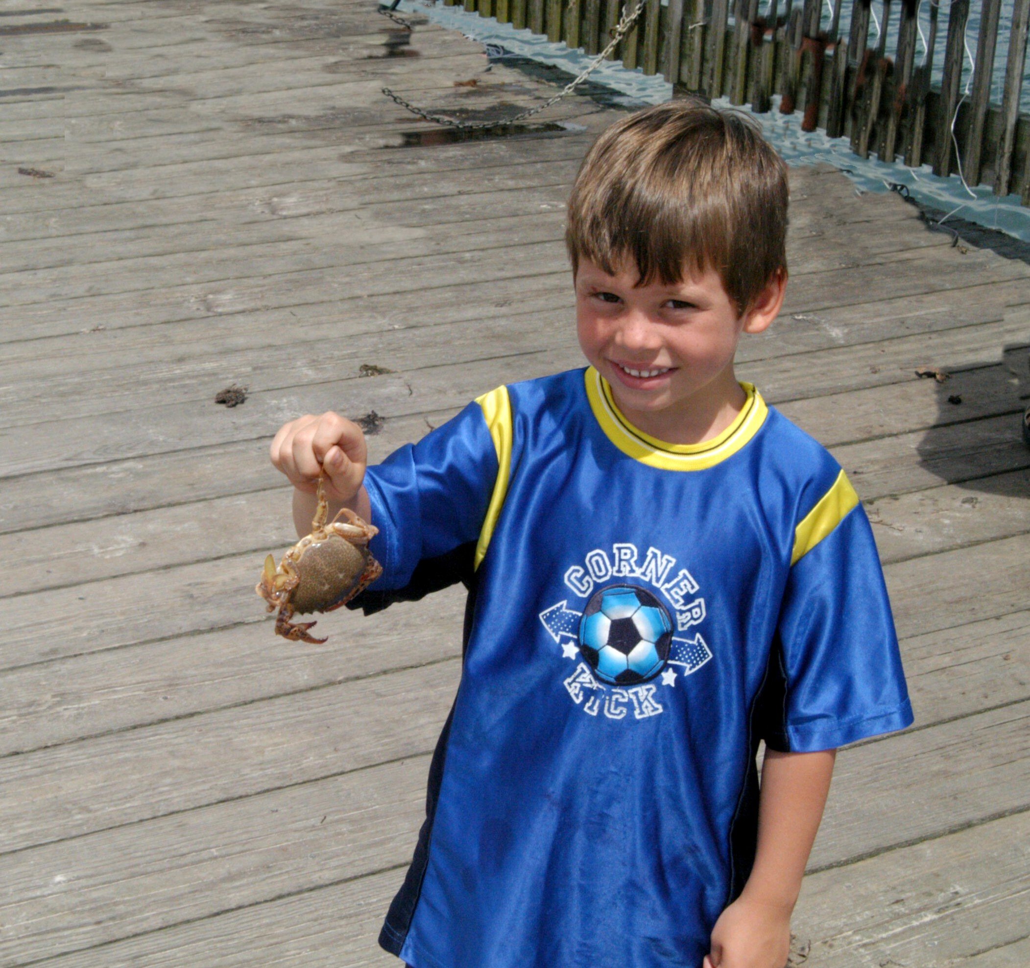 bass river crab and boy who caught it.jpg