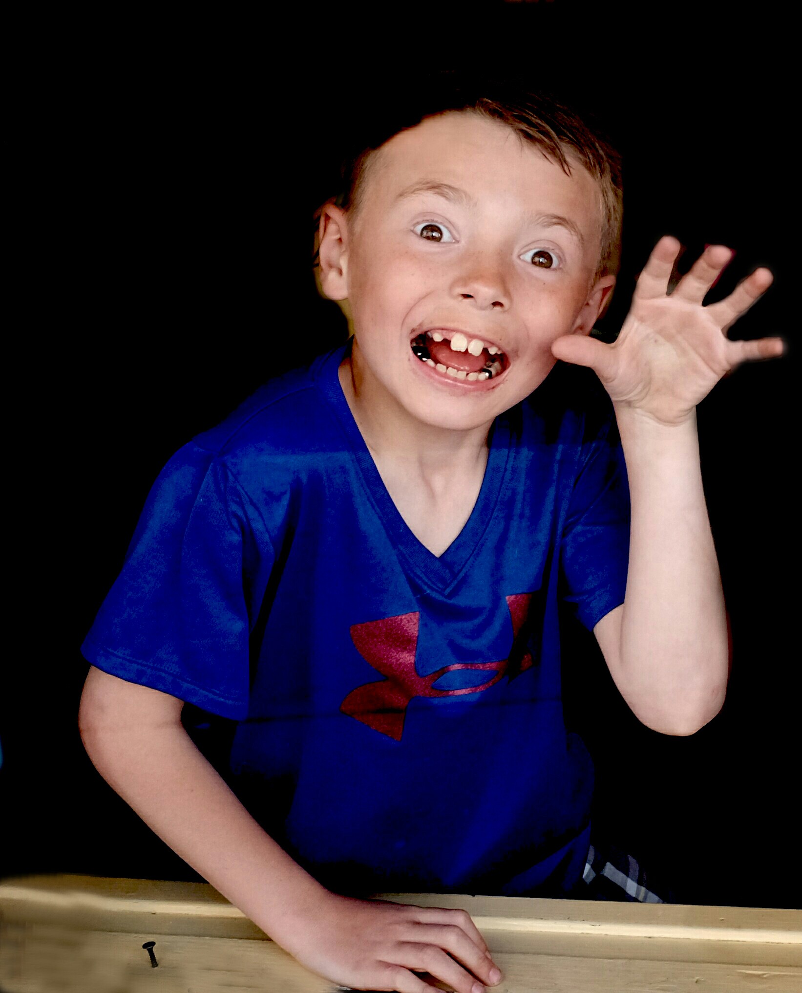 Boy in North End Window.jpg