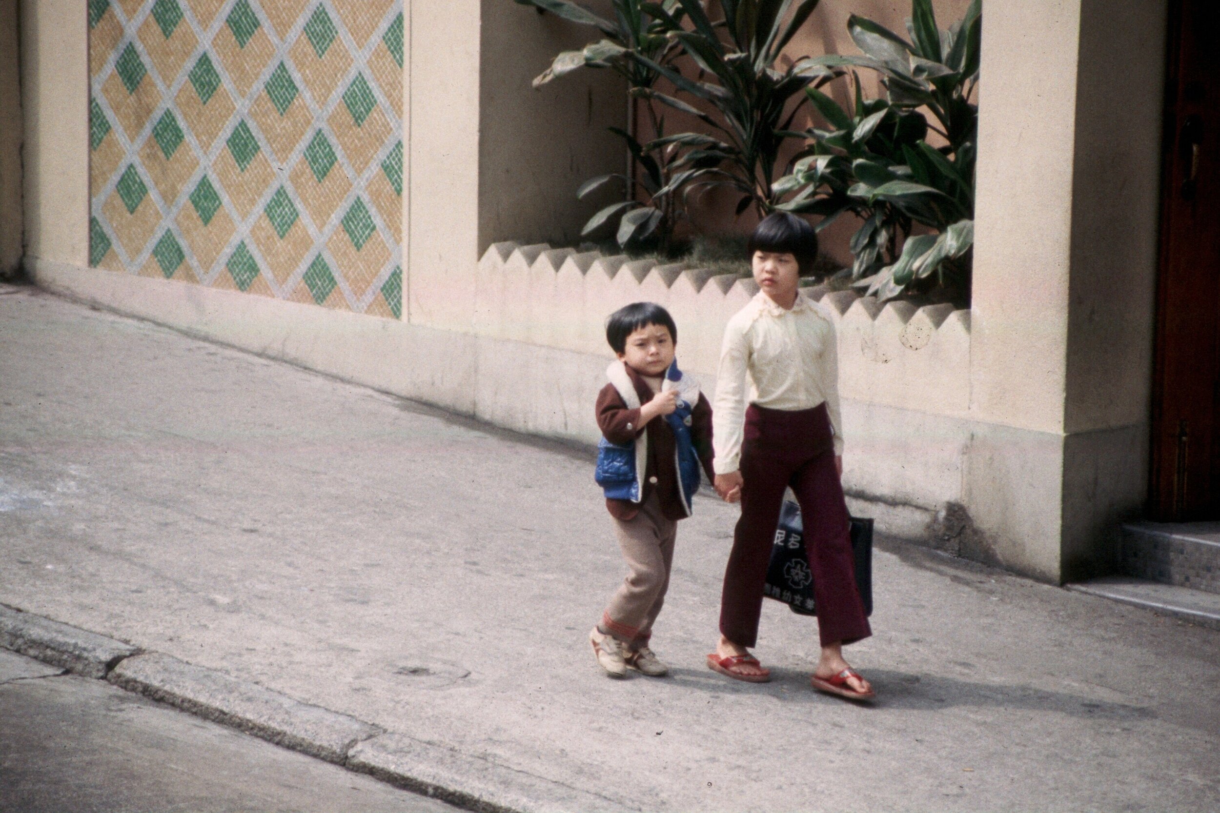 Two Japanese Children on sidewalk.jpg