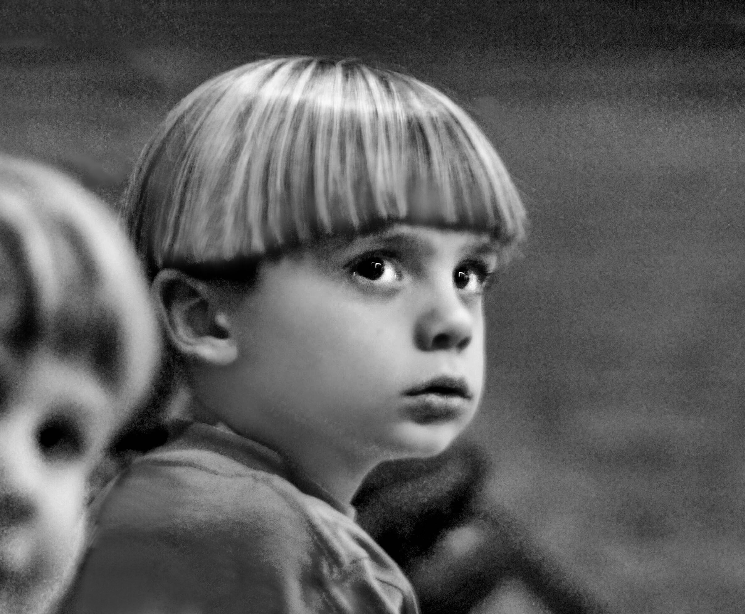 A boy watches on the sidelines-b&w.jpg