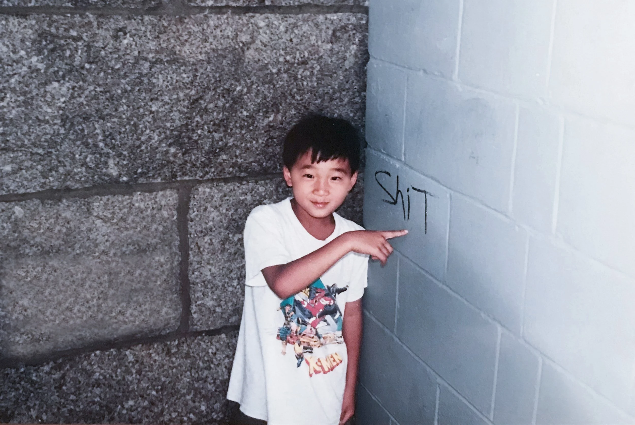 Matt points to shit on wall.jpg