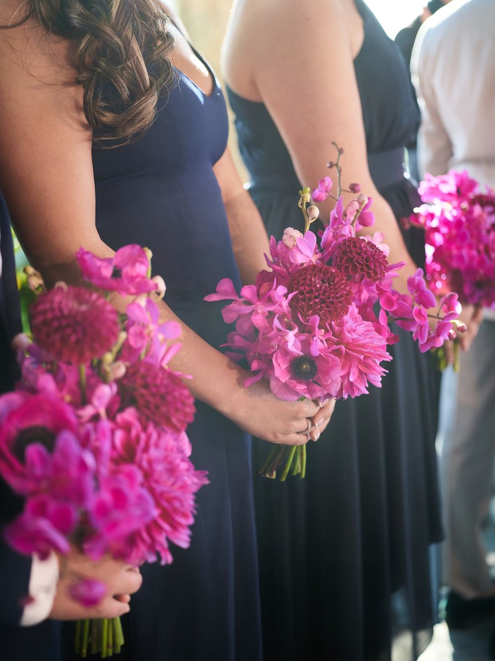 wedding-bouquet-with-hot-pink-flowers-navy-dresses.jpg