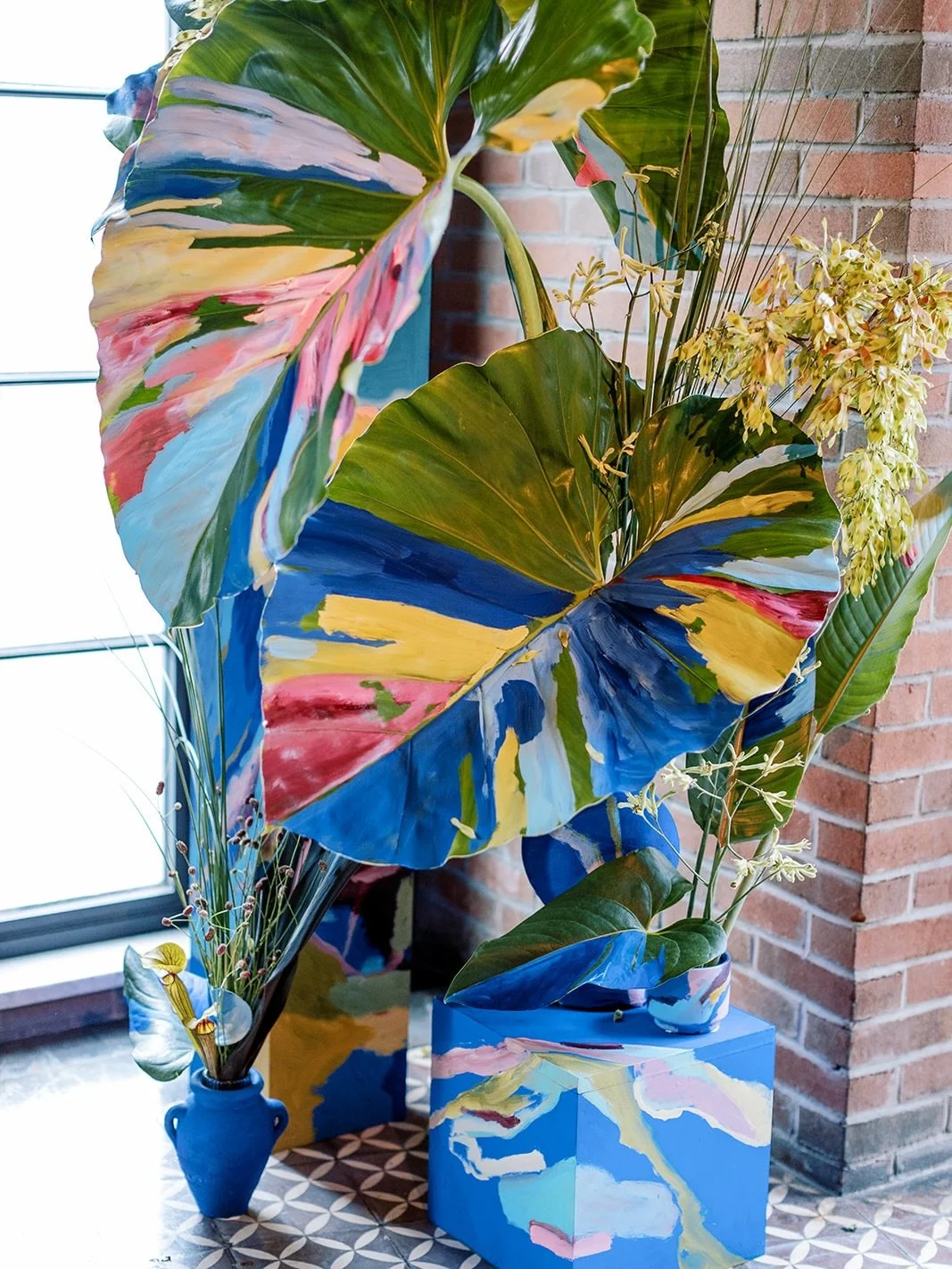 guests were greeted with hand painted flowers, works of art from @wifenyc and they&rsquo;re still talking about them!!! do you have a favorite?!? #handpainted #flowers #wifenyc 📷 @ambergressphotography