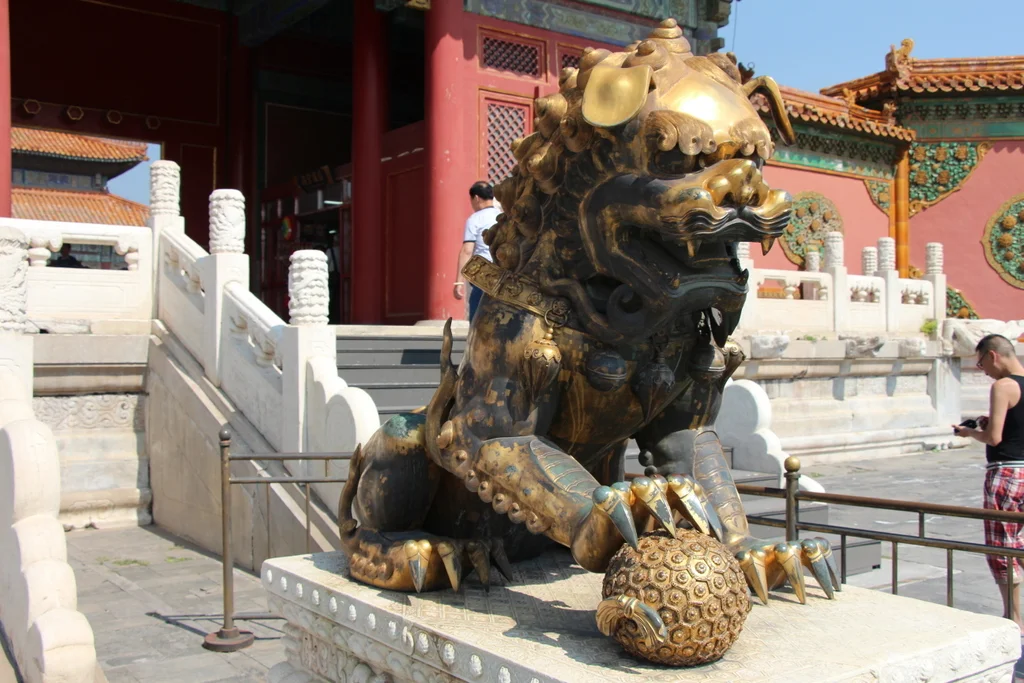...and the other is for the emperor, signified by the globe under his paw symbolizing the reach of the power of the emperor