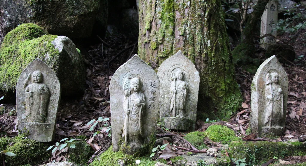 Miyajima: There is a large Buddhist temple on the island and we found these statues on a trail near the temple