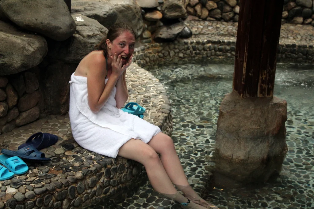 Last but not least, the hot springs had a fish pool! We’d seen this elsewhere in China and knew they were popular in Asia, but had not yet tried them. You put your feet in the water and the fish eat all the dead skin off your feet. It’s a strange tickly feeling that I found immensely entertaining. After a couple minutes, we adjusted and sat comfortably for our feet cleaning. Below is a video of me right after I stuck my feet into the pool.