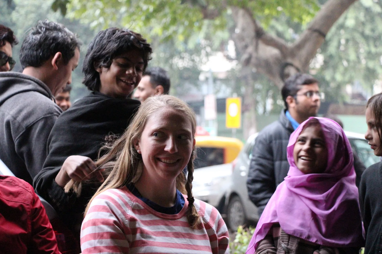 This photos was taken while sitting outside a restaurant in New Delhi. These girls really wanted to play with Kelsi's hair so she let them. They had a really good time and it was a fun exchange. At the end, sadly, they tried really hard to sell us pens and we had to repeatedly say no before our name was called to go inside and eat. 