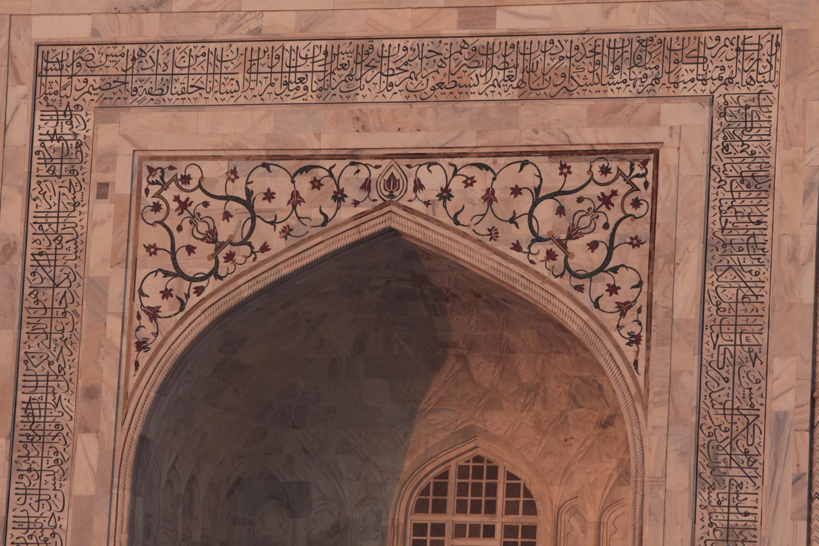 Much of the design on the building is Arabic calligraphy, as seen over this doorway. If you look carefully, you can see that the lines are not a random pattern but in fact Arabic words.