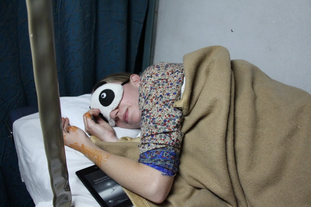Catching some shut eye on an Indian train