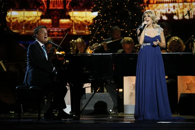 Michael W. Smith and Carrie Underwood perform at the "CMA Country Christmas" taping on Friday, Nov. 7, 2014 at the Bridgestone Arena in downtown Nashville. The holiday special airs Monday, Dec. 1 at 8/7c on the ABC Television Network.
